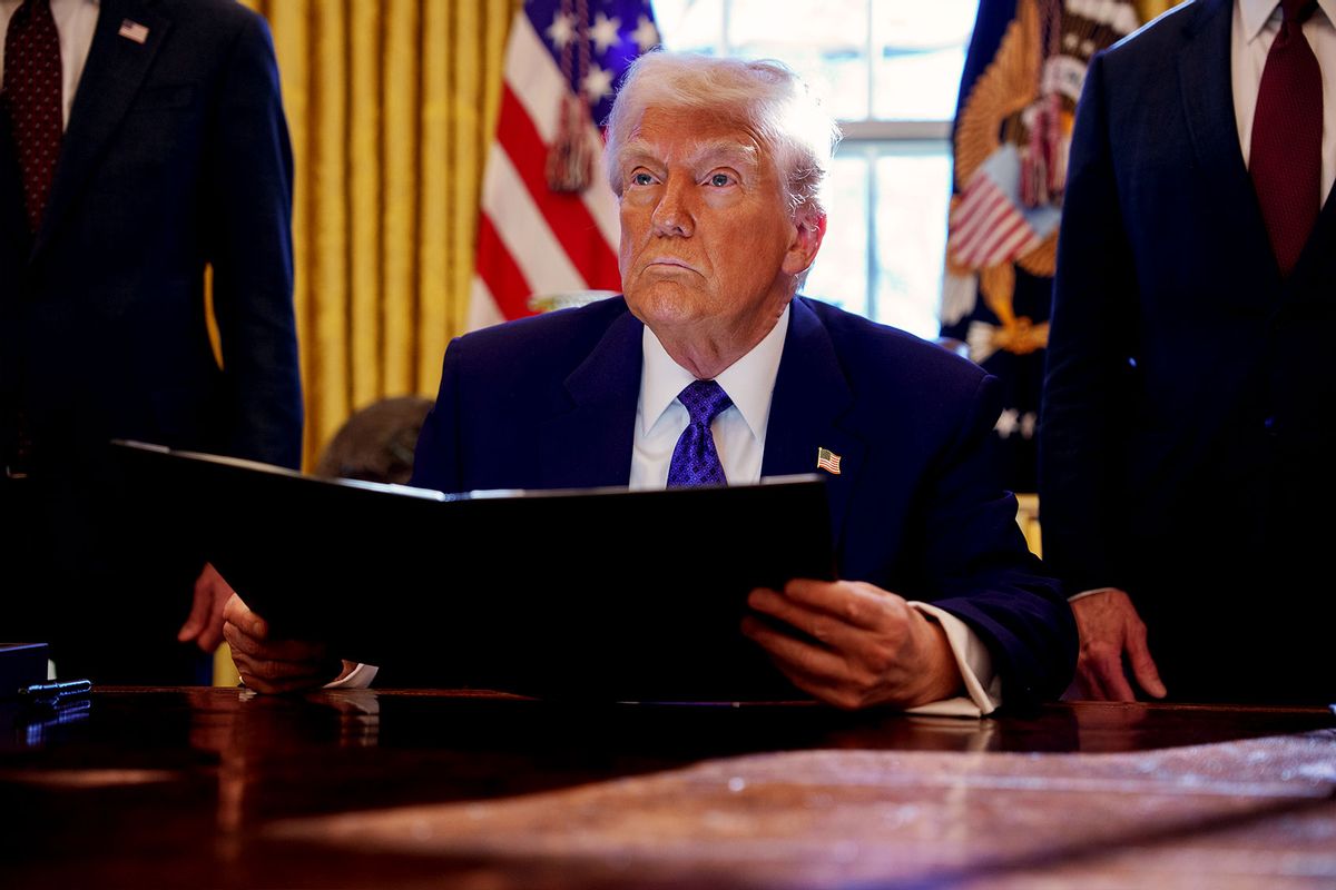 U.S. President Donald Trump holds an executive order establishing the Energy Dominance Council led by Secretary of the Interior Doug Burgum in the Oval Office at the White House on February 14, 2025 in Washington, DC. (Andrew Harnik/Getty Images)